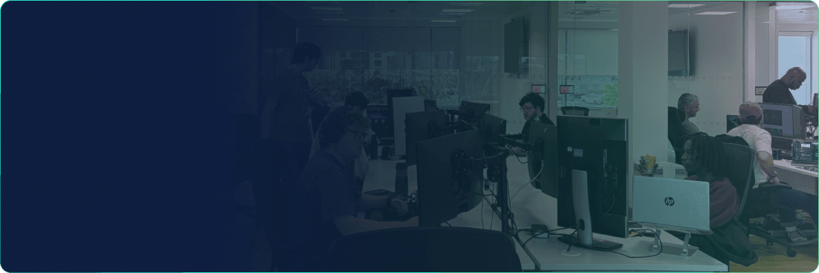 A picture of the arch office with developers working
