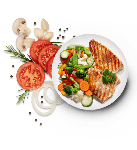 Salmon on a plate with vegetables and fruit